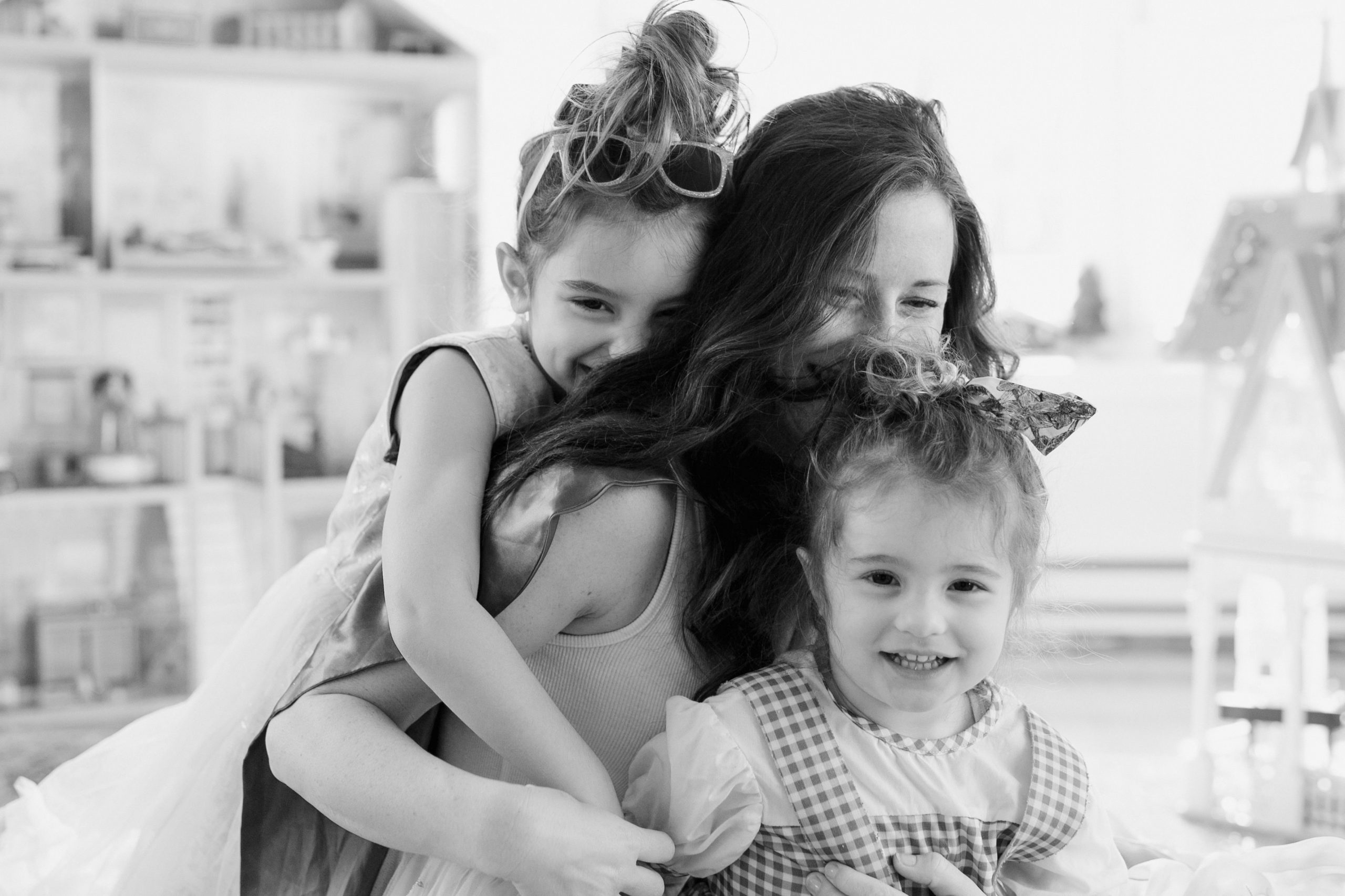 Mom with Daughters Coping with Fears of the Unknown During the Worldwide Pandemic